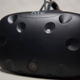 The HTC Vive has a front-facing camera that helps disorientation. It prevents the user from running into walls in the real world by displaying a warning in the game.